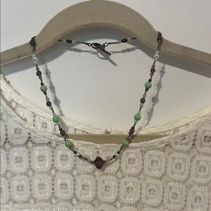 Elegant Beaded Necklace with Green and Purple Accents
